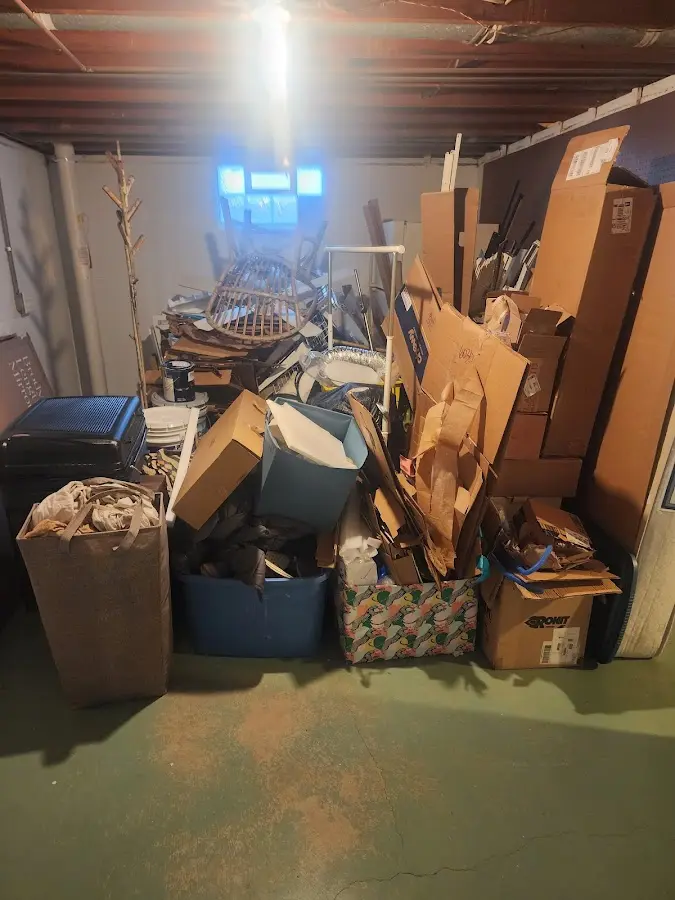 Roll-off dumpster container at job site for 2 Yard Dumpster Rental in Dryden